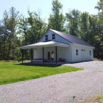 custom pole garage with overhang