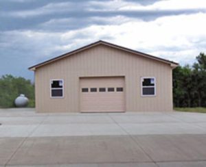 amish built detached garage with garage door, two windows