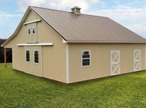 detached amish built tan garage with metal roofing